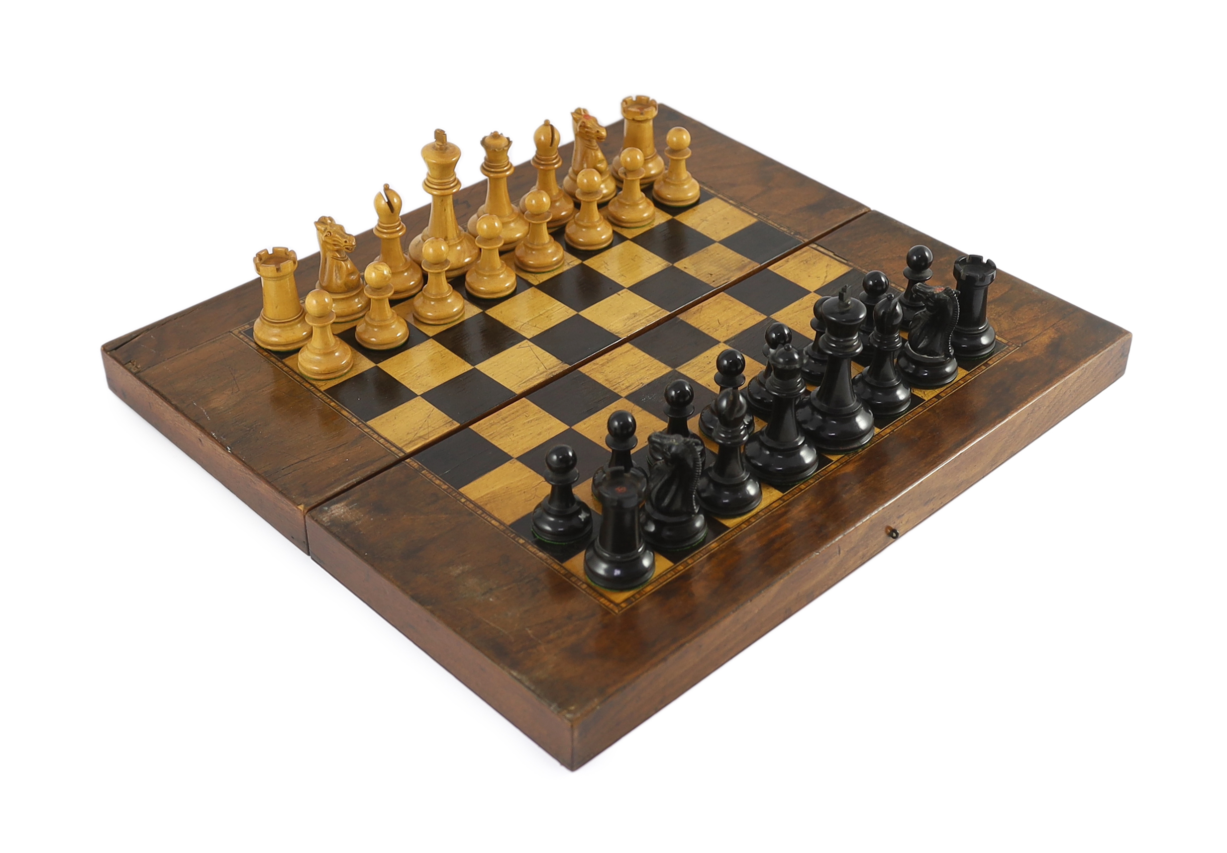 A Jacques ebony and boxwood Staunton pattern chess set, 44 x 39cm when open